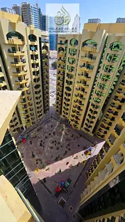 Two-bedroom apartment with a living hall for annual rent in Al Rashidiya Towers – Ajman, in a prim