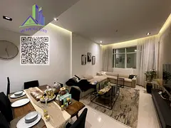 Luxury 2-bedroom apartment for sale in Ajman, UAE, unfurnished.