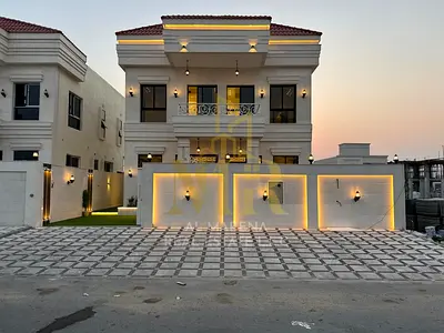 Luxury villa for sale, including registration and ownership fees, near Azha Complex. Featuring a modern design and high-end finishes, this spacious vi