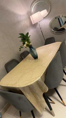 Dining table with chairs and floor lamp and wall Mirrors