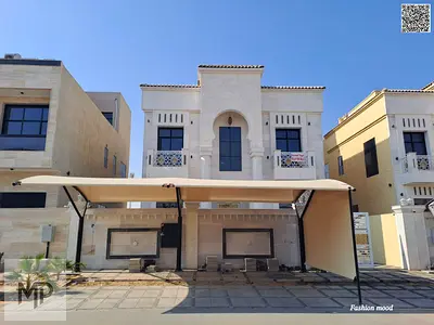 Villa for sale at ajman| al amerah area| 6 master rooms, majlis, 2 halls, roof| freehold for all nationalities.