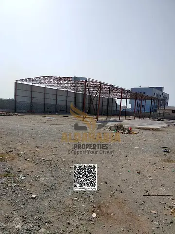 A great opportunity for businesses looking for a spacious yard in a strategic location. The property is located on a corner asphalt road in Umm Al Thu