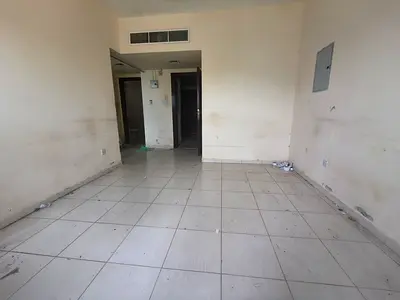 Spacious 1BHK close to road with central AC and 6 cheque payment
