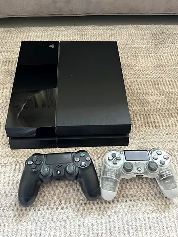 PS4 Sony Playstation 4 with two remotes excellent condition