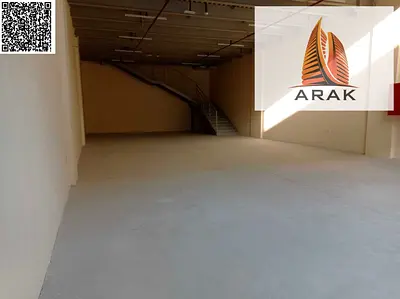 For annual rent warehouses in Al Jurf3 ideal for commercial and industrial use offering large space practical layout mezzanine and 3 phase electricity