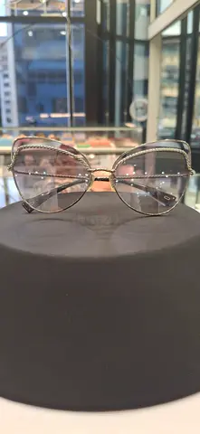 Silver round sunglasses with crystal accents - gently used