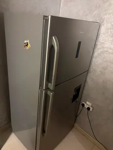 - *Hisense bottom‑freezer refrigerator