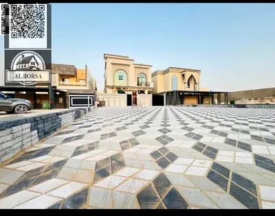 Luxurious villa for sale in Ajman, Al Waha 1 project, next to Azha, near the main street. 3 floors, 7 master bedrooms, a living room, 2 halls, a main
