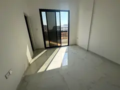 One bedroom and living room apartment for annual rent in a new building, first occupancy, in Al-Aliy