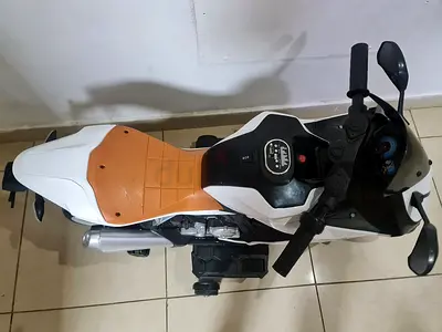Childrens electric ride-on motorcycle (white/brown) - very good condition condition