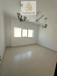 Al Nuaimiya, directly on Al Ittihad Street, close to Emirates Markets - Two bedrooms, living room, t