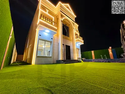 Luxury villa with a classic design and private pool for sale in Ajman – Al Yasmeen area | 5 bedrooms, majlis, 2 living rooms, maid's room | Freehold o