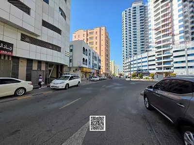 Land for sale in Al Rashidiya2, prime location opposite Falcon Towers.