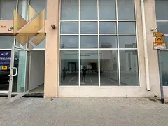 Exceptional opportunity: Spacious showroom on a main street for AED 100,000, featuring full faciliti