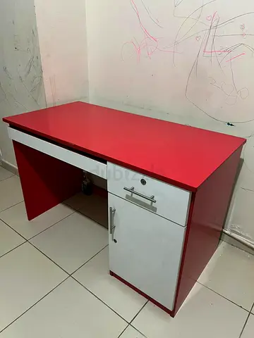 My red and white study desk with drawer and cupboard