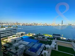 Mid Floor Unit with Pool and Creek View