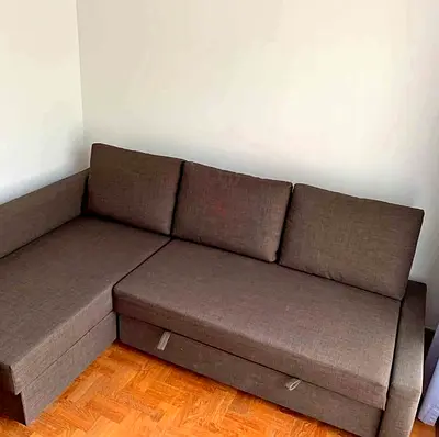 L-shaped brown fabric sofa - good condition