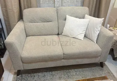 Comfortable Beige Two-Seater Sofa 2 Nos