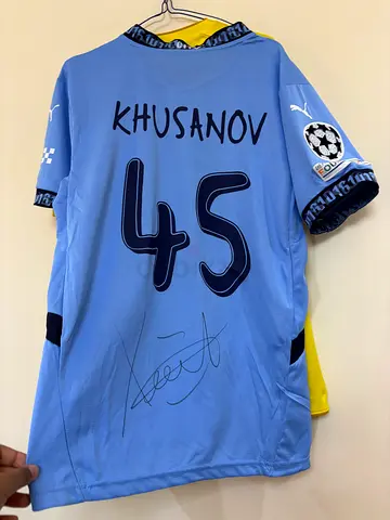 signed khusanov jersey