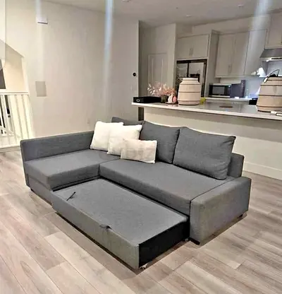 Ikea L Shape Sofa cum bed with big storage in L