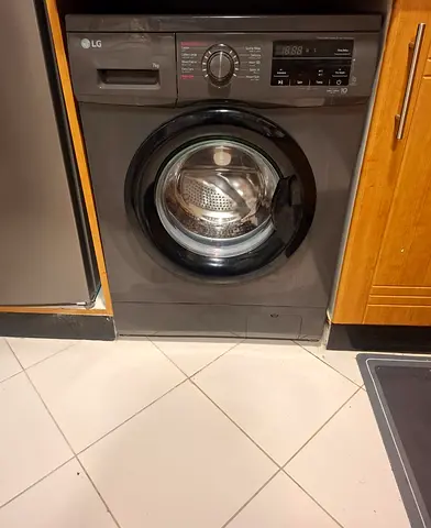 LG Front Load Washing Machine latest model like new condition  more details contact me