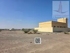 Residential land for sale in Manama, Block 4, prime location close to services, freehold ownership f