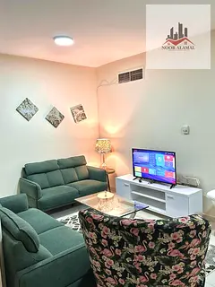 Sharjah, Al Majaz 3 One bedroom, living room, kitchen, two bathrooms, and balcony.