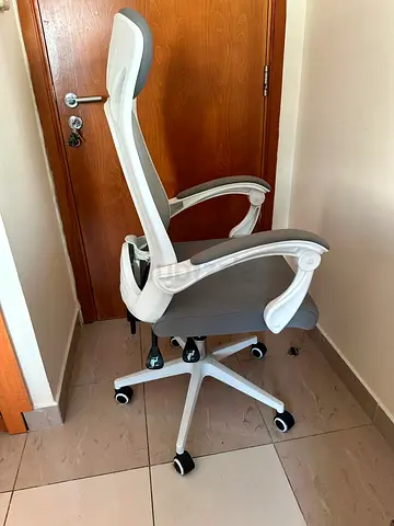 My ergonomic grey office chair with headrest