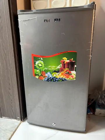 Refrigerator with Shoe rack and chair