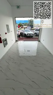 Commercial shops for annual rent in Al Jurf 2, Ajman with good sizes and practical finishing Water +