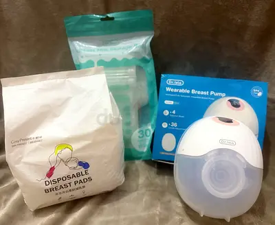 My wearable electric breast pump with disposable breast pads and milk storage bags