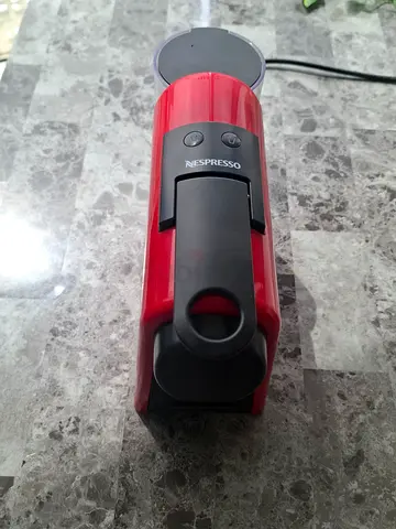 Red Nespresso capsule coffee machine - used, working