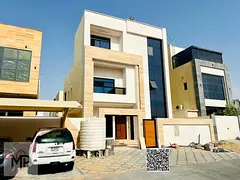 Luxury villa for sale in Al Yasmin, Ajman, in a prime location on a main road. Electricity and water