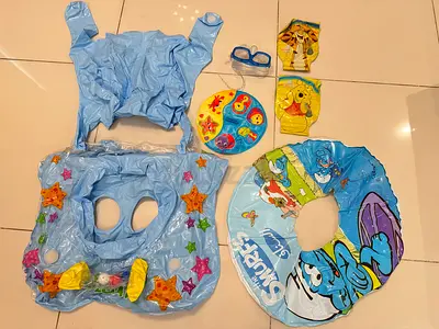 Baby Swimming Float with Accessories altogether for at 20 aed only