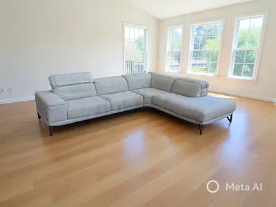 Almost like new condition Natuzzi L shape sofa