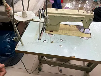 Used industrial sewing machine with table and motor