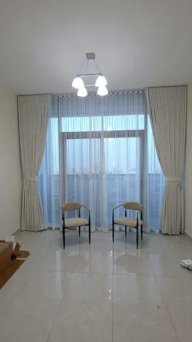 Elegant Sheer Curtains with Modern Lighting