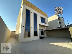 For sale villa - two floors &amp; a large yard - close to Sheikh Mohammed bin Zayed Street - free ow