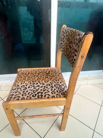 Wooden leopard-print accent chair (used)