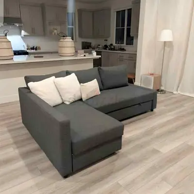 Ikea L Shape Sofa cum bed with big storage in L