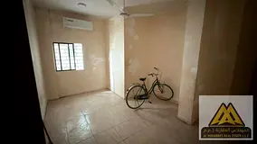 Studio apartment for annual rent in Al Nakheel 1, Ajman, near the Corniche. Large area, kitchen, and