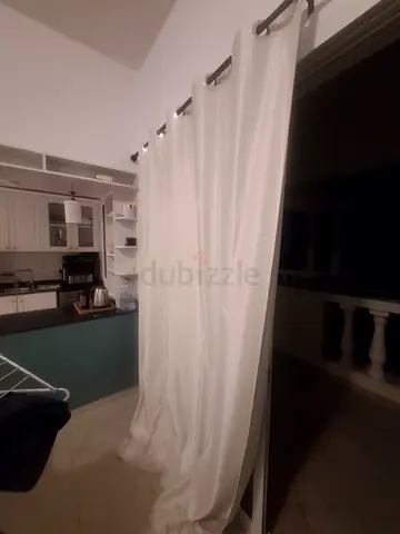 White grommet curtains, used - good condition. 3 piece + additional 2  brand new. Long. Sun blinder.