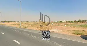 A prime commercial plot located in Al Helio 2, ideal for developing retail shops or a small commerci