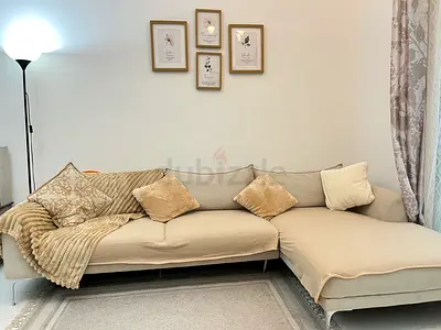Luxury 4 seater beige L-shaped sofa with chaise - comfortable and cozy vibe