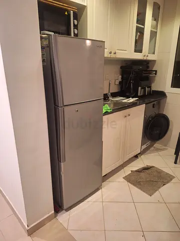 Stainless steel refrigerator  freezer, good working condition