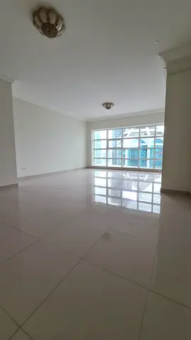 A distinctive apartment with a spacious layout, featuring three master bedrooms, a large living room, a maid's room with its own bathroom, five bathro