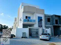 For sale villa - two floors &amp; a large yard - close to Sheikh Mohammed bin Zayed Street - free ow