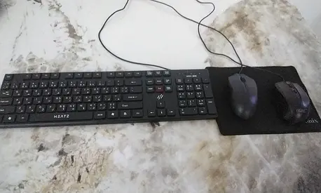 1 Keyboard 2 mouse and a mouse pad combo