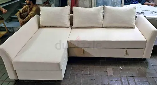 Beige L-shaped sofa bed with storage