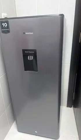 Sleek Refrigerator with Ample Storage Space and in built water dispenser